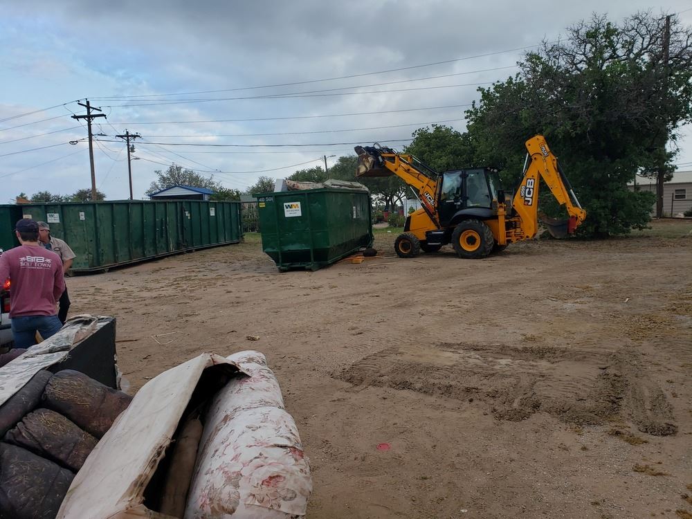 Machine Disposing of Trash (JPEG)